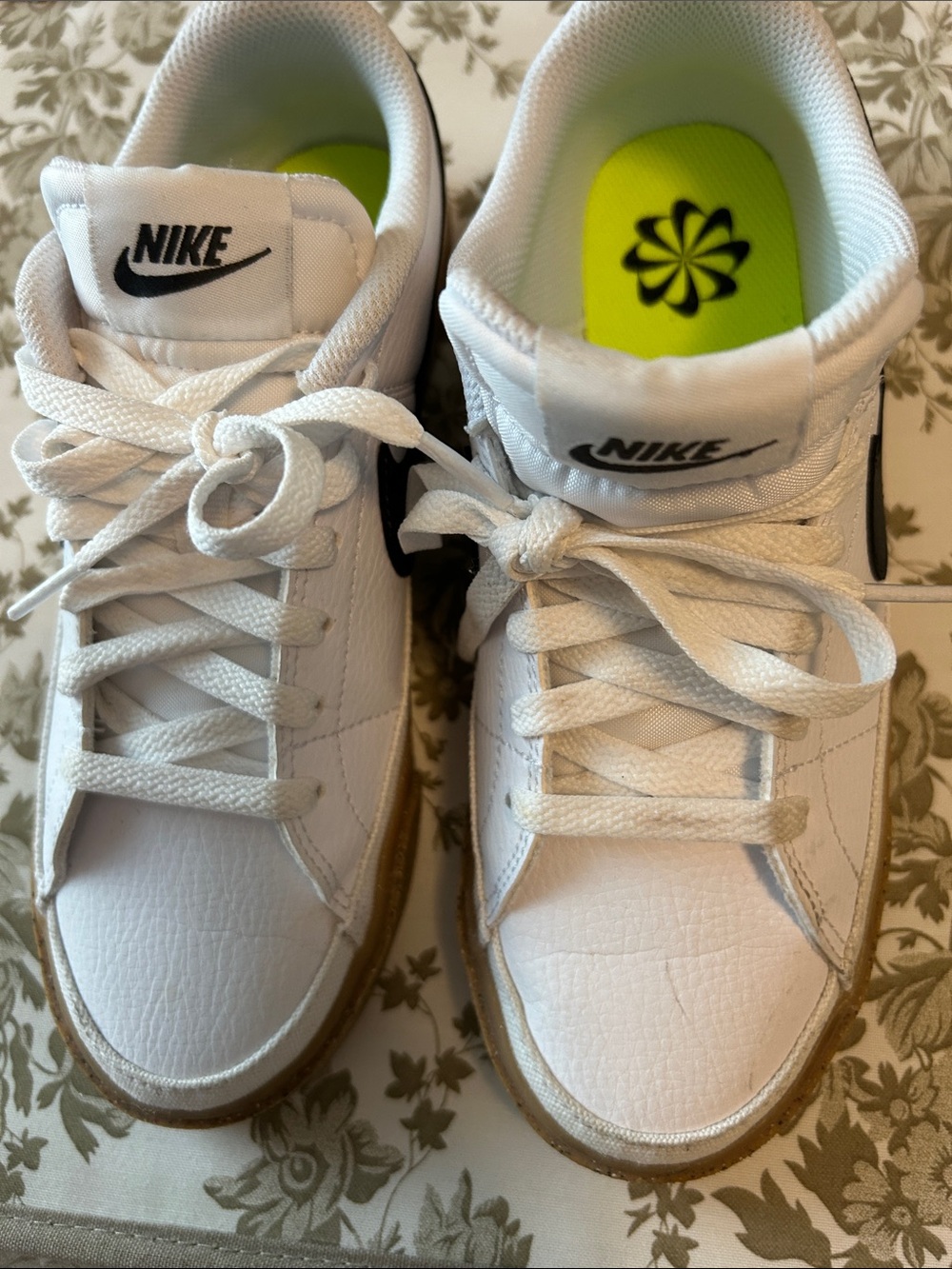 Nike White Sneakers with Black Swoosh and Gum Sole